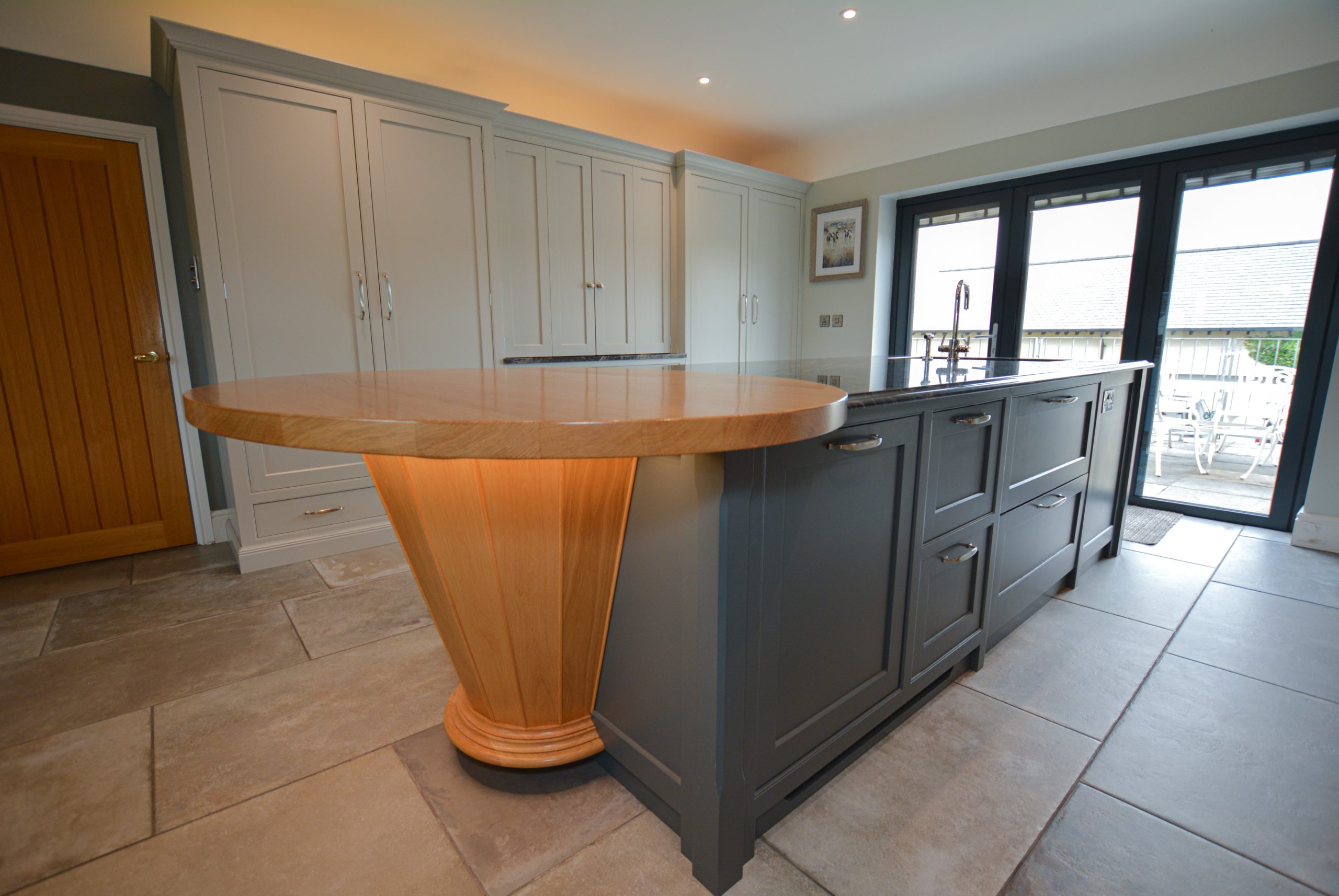 Handmade Oak feature on bespoke shaker style kitchen